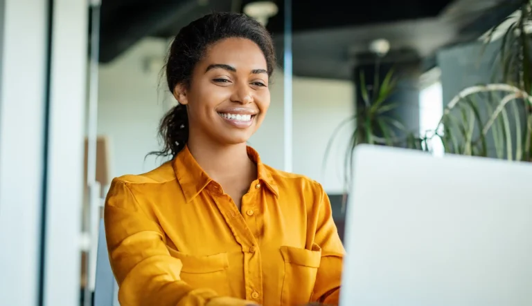 woman using laptop typing